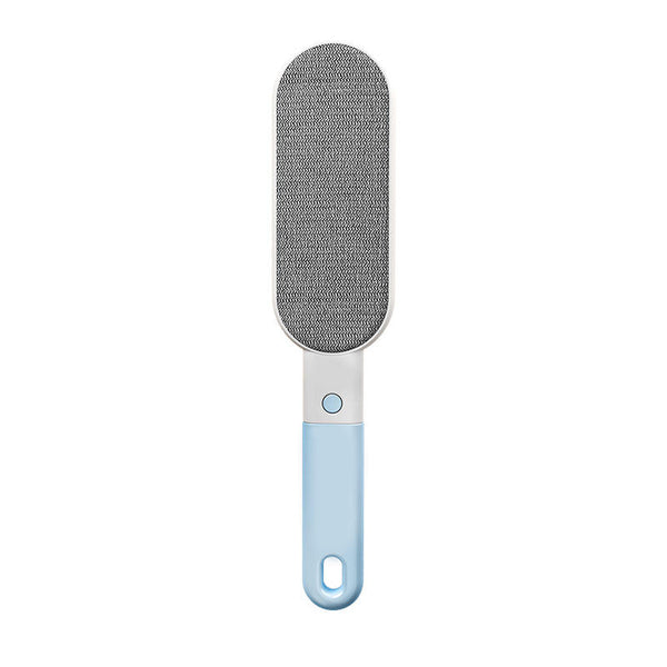 Blue double-sided pet hair remover brush, front view