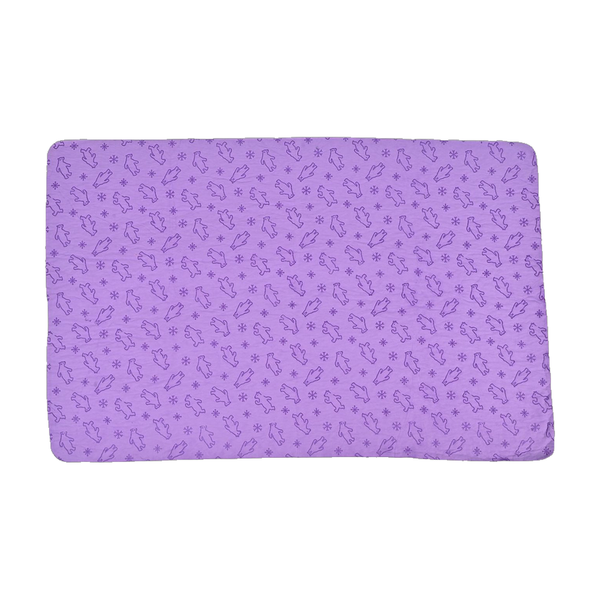 Purple chamois dog drying towel with an embossed pet pattern, white background