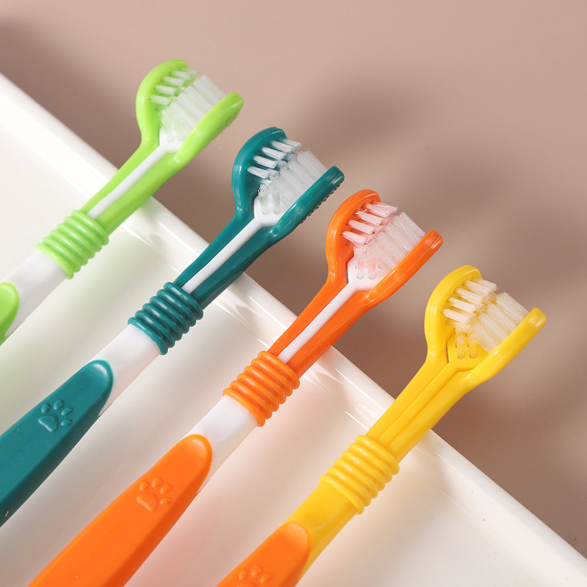 Three sides, in one head. See the bristles facing into the centre.