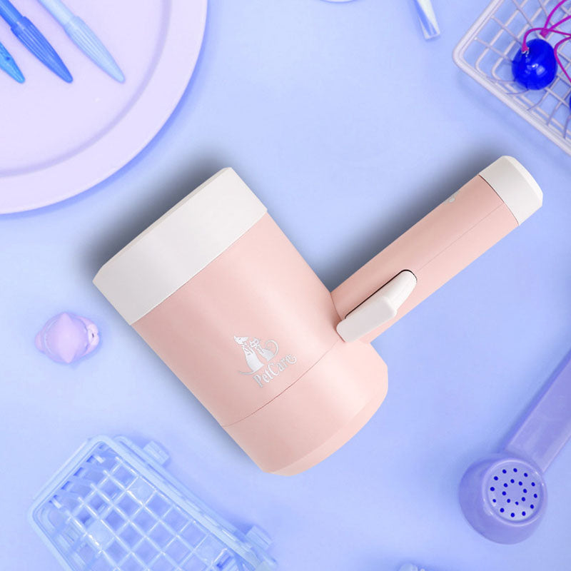 Pink paw cleaner cup with white rim and side handle, side view