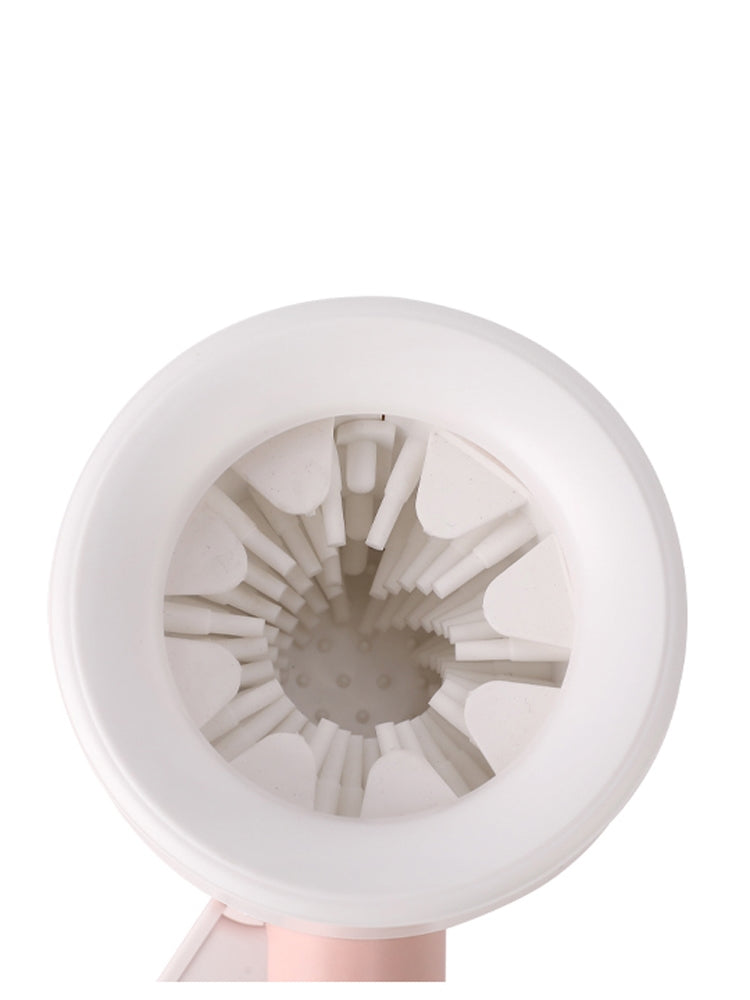 Top-down view of the soft silicone bristle insert inside the paw cleaner cup