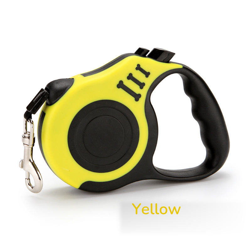 Yellow retractable leash with a black grip, side view on white
