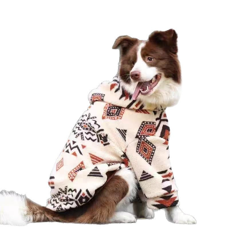 The cream patterned fleece on a sitting dog, cut out on a white background