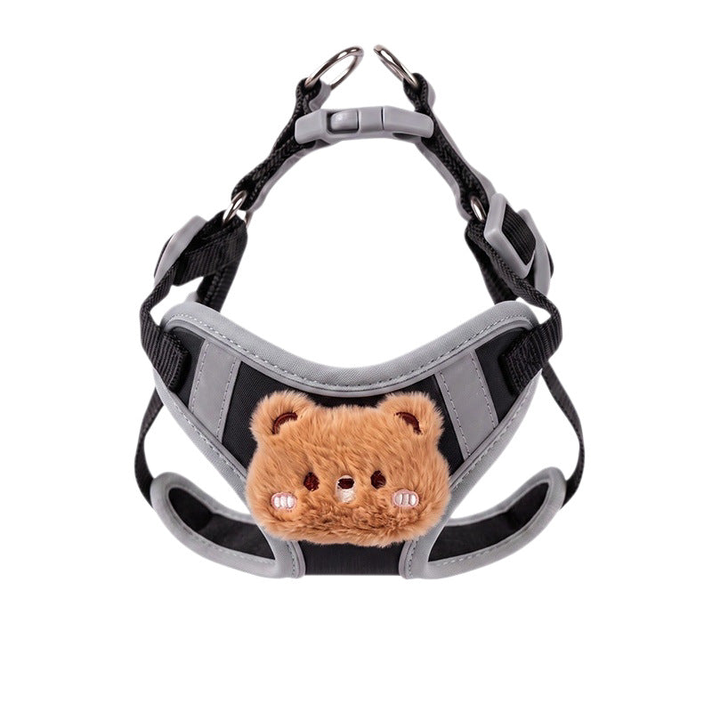 Black and grey mesh vest harness laid flat on white with a plush bear face at the chest