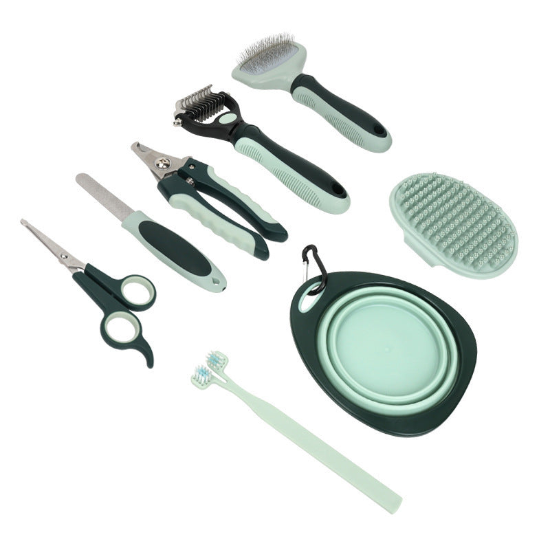 The eight tools from the sage green grooming kit laid out on white