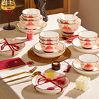 Peony and Gold Rim Dinnerware, Sold by the Piece. A cream body with a soft pink and coral floral motif and a fine gold-toned line at the rim.