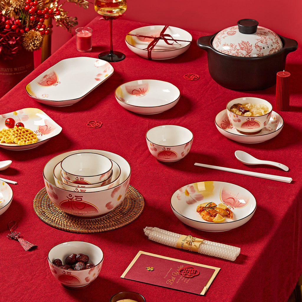 Peony and Gold Rim Dinnerware, Sold by the Piece. A cream body with a soft pink and coral floral motif and a fine gold-toned line at the rim.