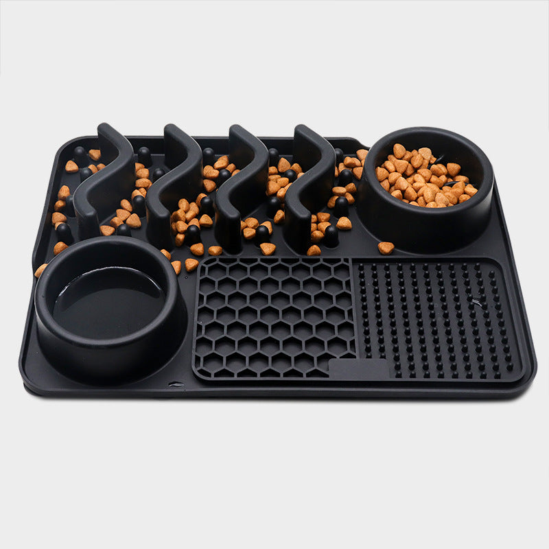 Small tray in Black with kibble in the channels, a deep round well and the honeycomb lick panel