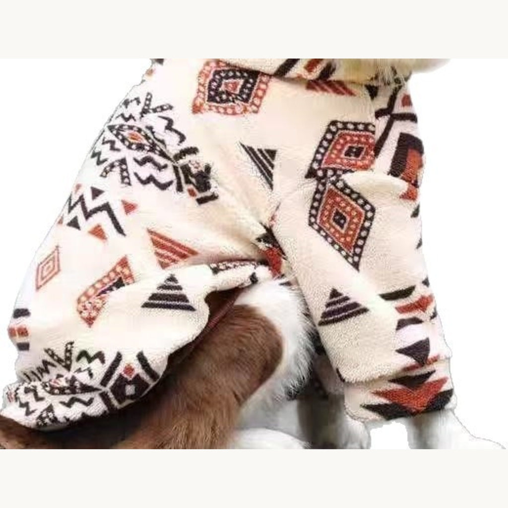 Lower half of the patterned pullover with the sleeve hems above the paws