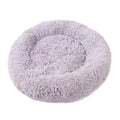 Light grey long-pile donut bed seen from above on a plain white background
