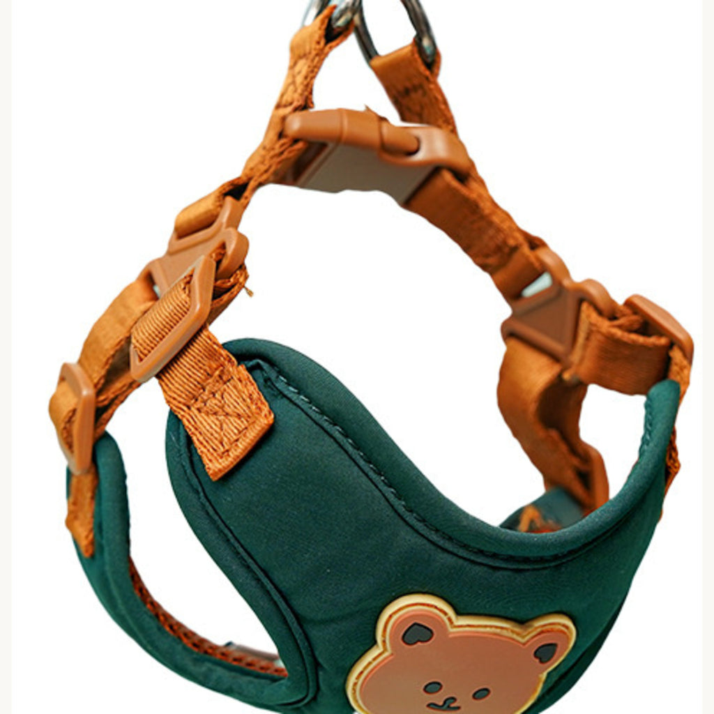 Closer view of the green chest panel, tan straps and adjuster buckles