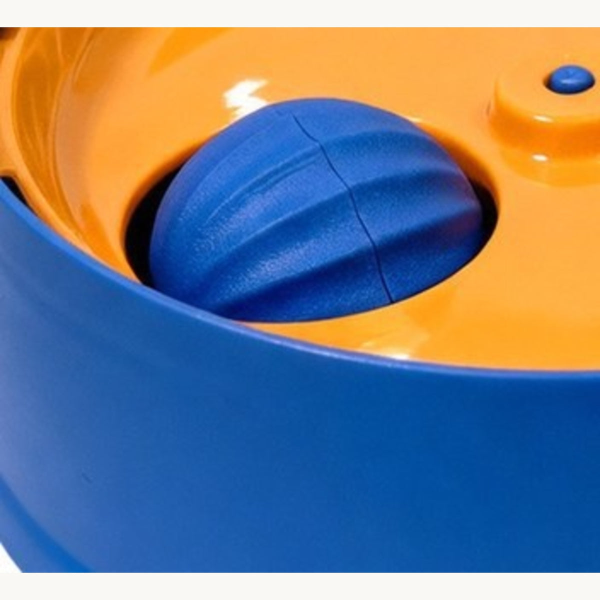 Close-up of the blue ball sitting in its moulded channel