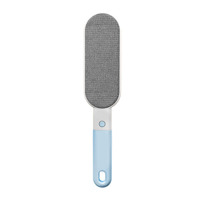 Blue double-sided pet hair remover brush, front view