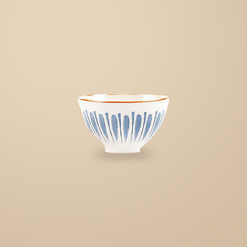 Blue Rhyme 4.5 in rice bowl, on a warm beige background.