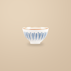 Blue Rhyme 4.5 in rice bowl, on a warm beige background.