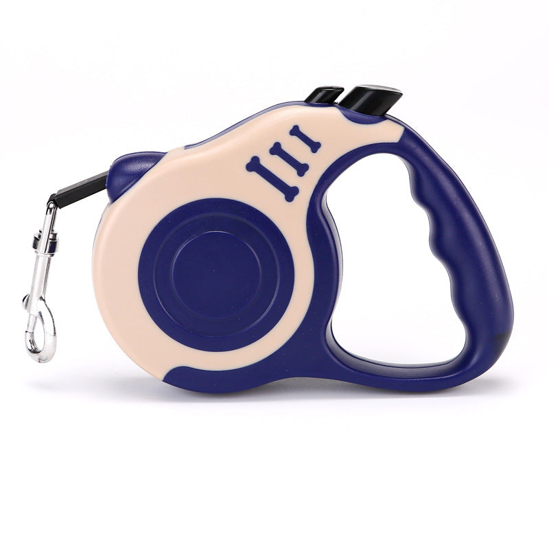 Navy and cream retractable leash with a navy grip, side view on white