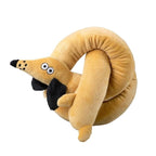 Tan plush dachshund-style long dog toy coiled up, with black ears and felt eyes, white background