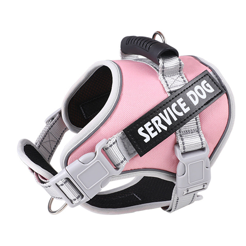 Pink padded harness angled towards the camera, top handle and two side buckles in view