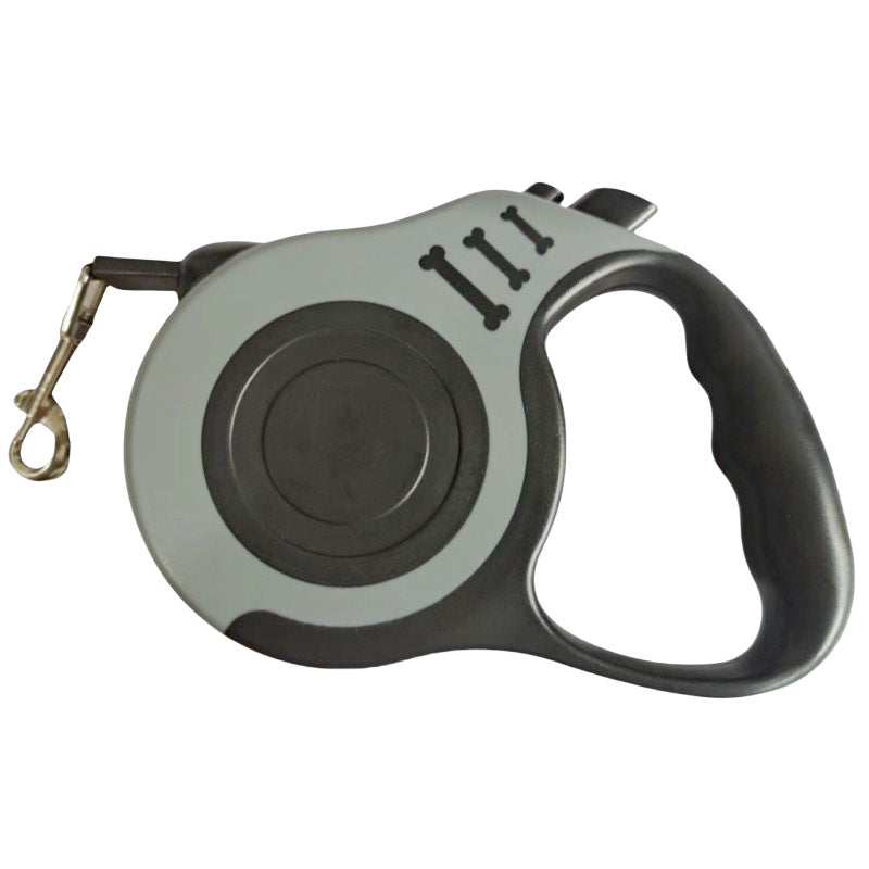 Grey retractable leash with a dark grey grip, tilted three-quarter view on white