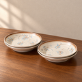 7inch rice plate-4 pieces, cream glazed with a hand-painted blue and brown sprig.
