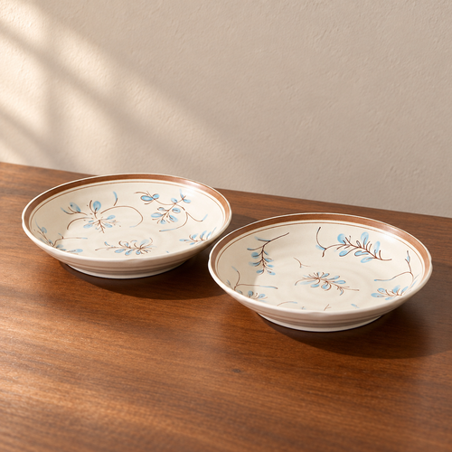 7inch rice plate-2 pieces, cream glazed with a hand-painted blue and brown sprig.