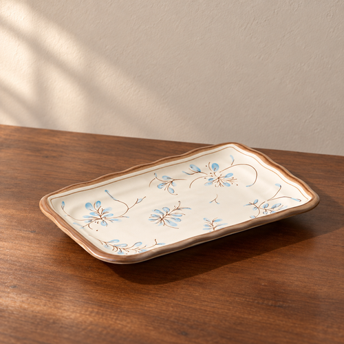 10inch rectangular plate-1 piece, cream glazed with a hand-painted blue and brown sprig.