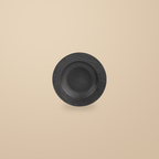Rock Texture black 9 in pasta bowl, on a warm beige background.