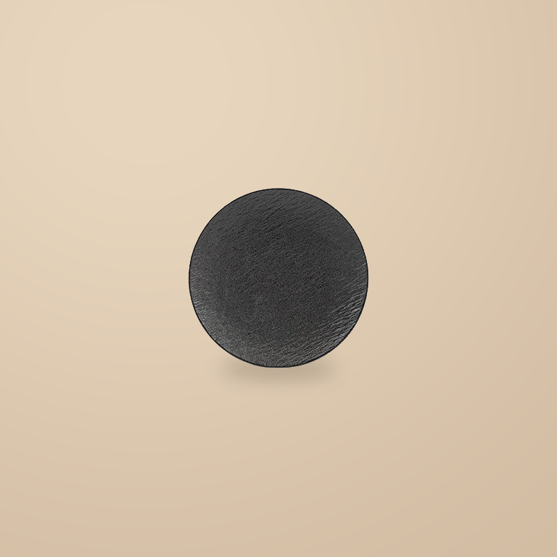 Rock Texture black 8 in plate, on a warm beige background.