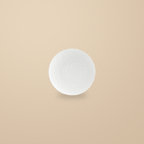 Rock Texture white 8 in deep plate, on a warm beige background.