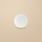 Rock Texture white 8 in plate, on a warm beige background.
