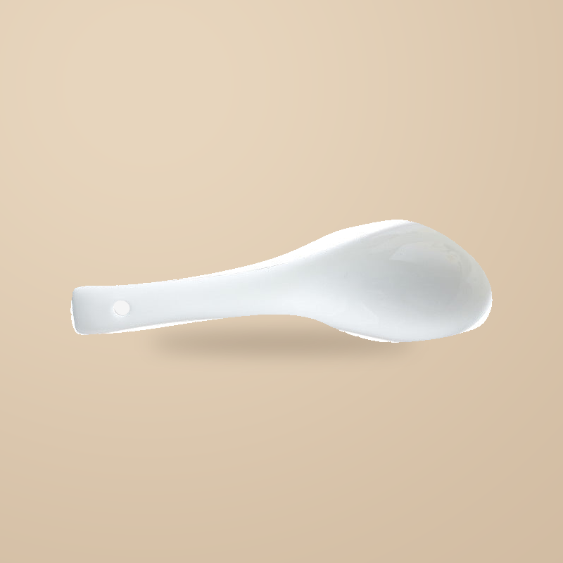 Simple Retro small spoon, on a warm beige background.