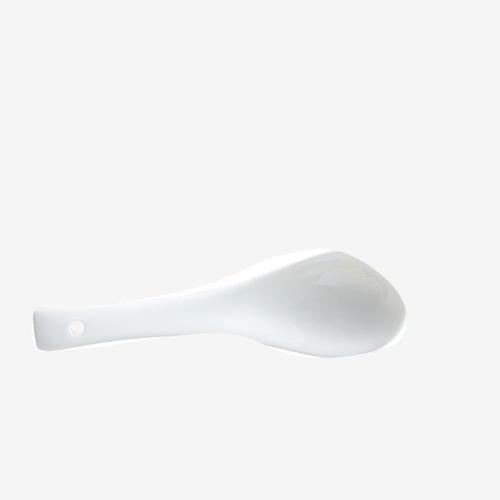 A single porcelain soup spoon, cream glazed, shown on its own against a plain light background.
