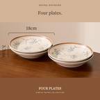 Four Simple Retro 7 in plates in two stacks, 18 cm across and 3.7 cm tall.
