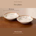 Two Simple Retro 8 in plates on a wooden table, 20.5 cm across and 4 cm tall.