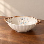 9inch double-eared soup bowl-1 piece, cream glazed with a hand-painted blue and brown sprig.