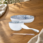 Yamada Starfish pattern pieces on a wooden table: rice bowl, plate, spoon and chopsticks.