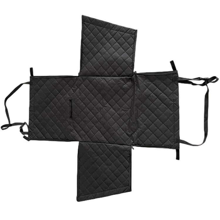 Black quilted dog car seat basket laid flat with side flaps and straps