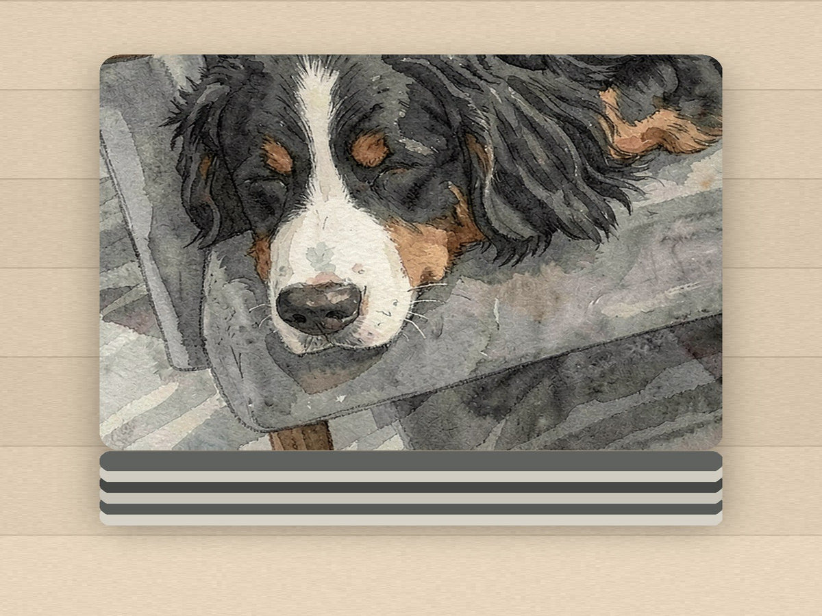 Folded fleece blanket showing a close crop of the sleeping Bernese Mountain Dog illustration and the stacked folded edges