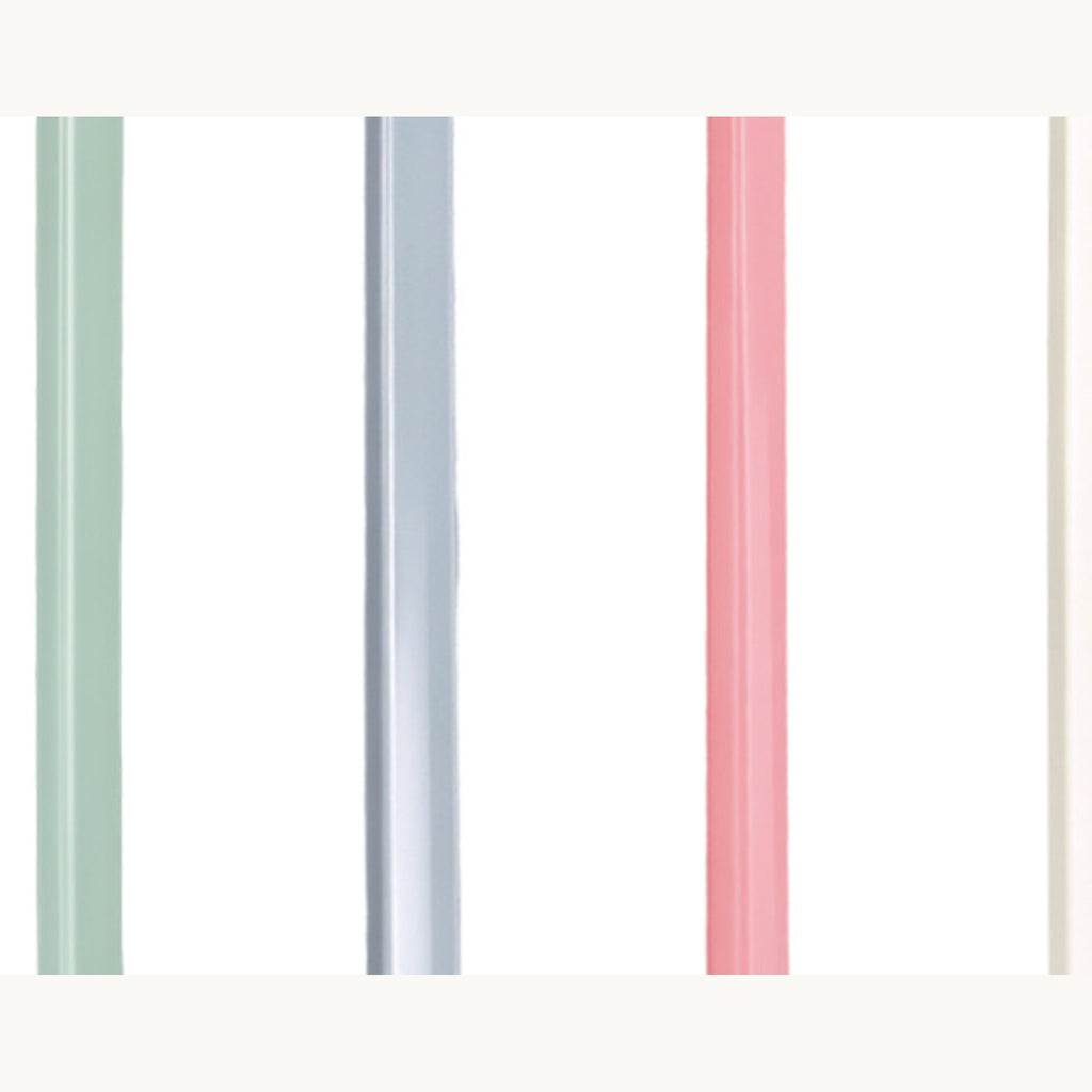 The cat toothbrush in three colourways, laid side by side