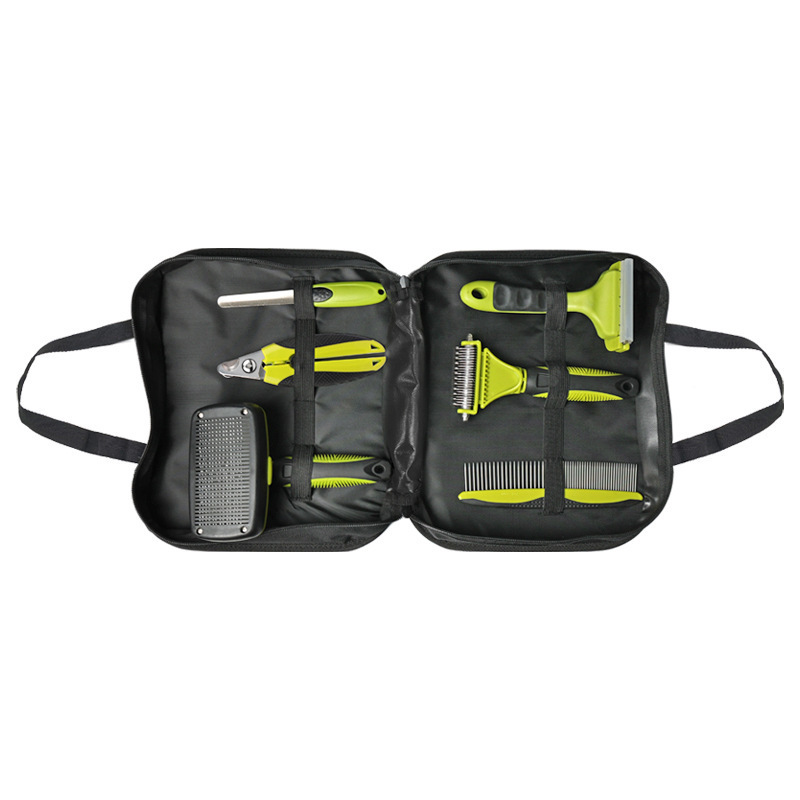 Black and lime dog grooming kit in its zip carry case with a self-cleaning slicker brush, nail file, nail clipper, deshedding tool, dematting rake and steel comb
