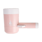 Pink dog paw washer cup with its side handle, white background