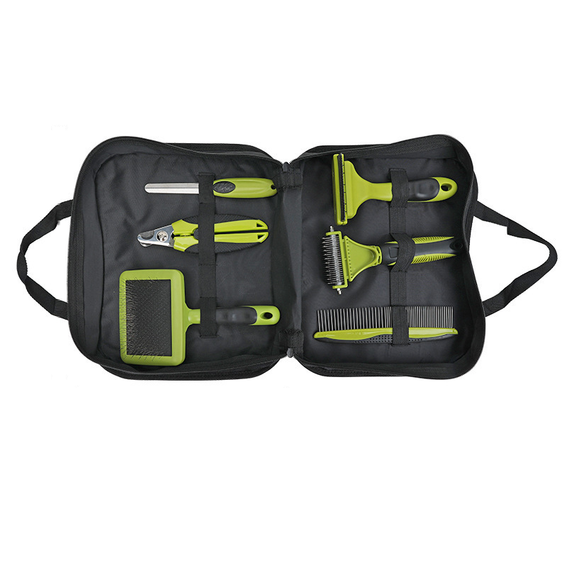Black and lime dog grooming kit in its zip carry case with a classic slicker brush, nail file, nail clipper, deshedding tool, dematting rake and steel comb