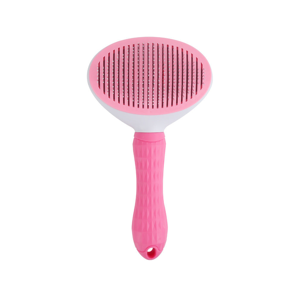Pink self-cleaning dog slicker brush, white background