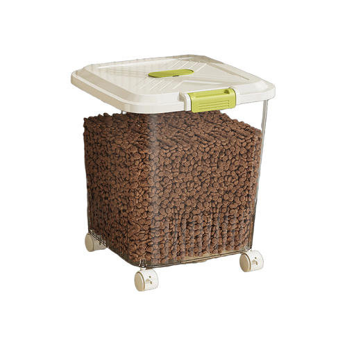Clear airtight pet food storage container on wheels filled with kibble, green latch lid, white background