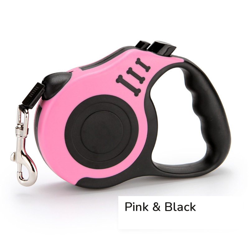 Pink retractable leash with a black grip, side view on white