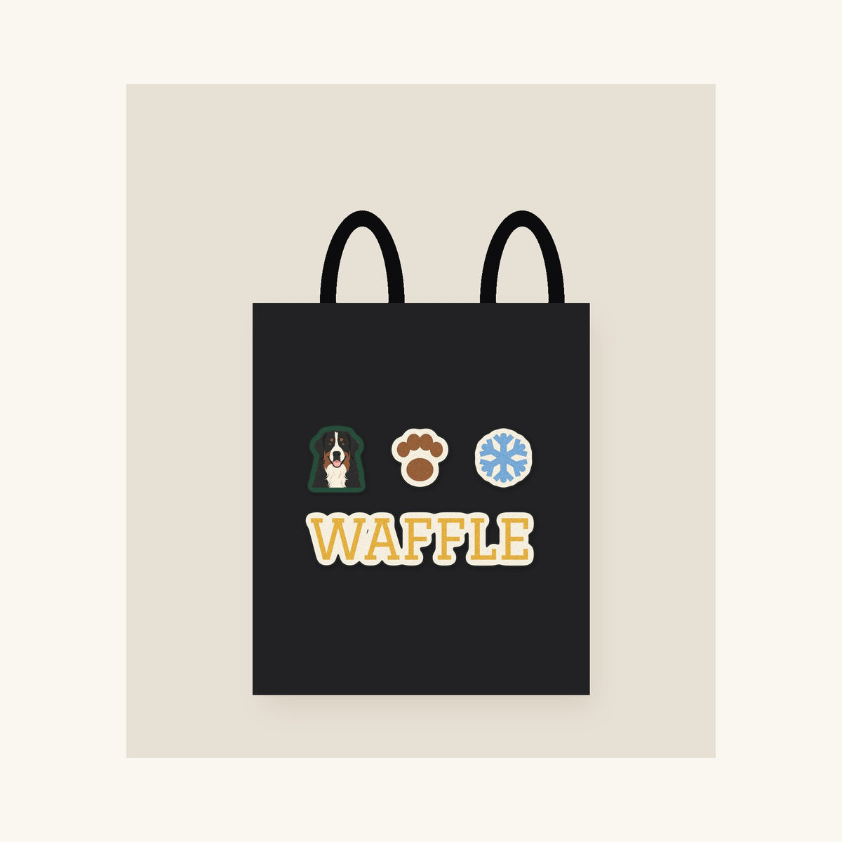 Black canvas tote with a dog's name and three icons