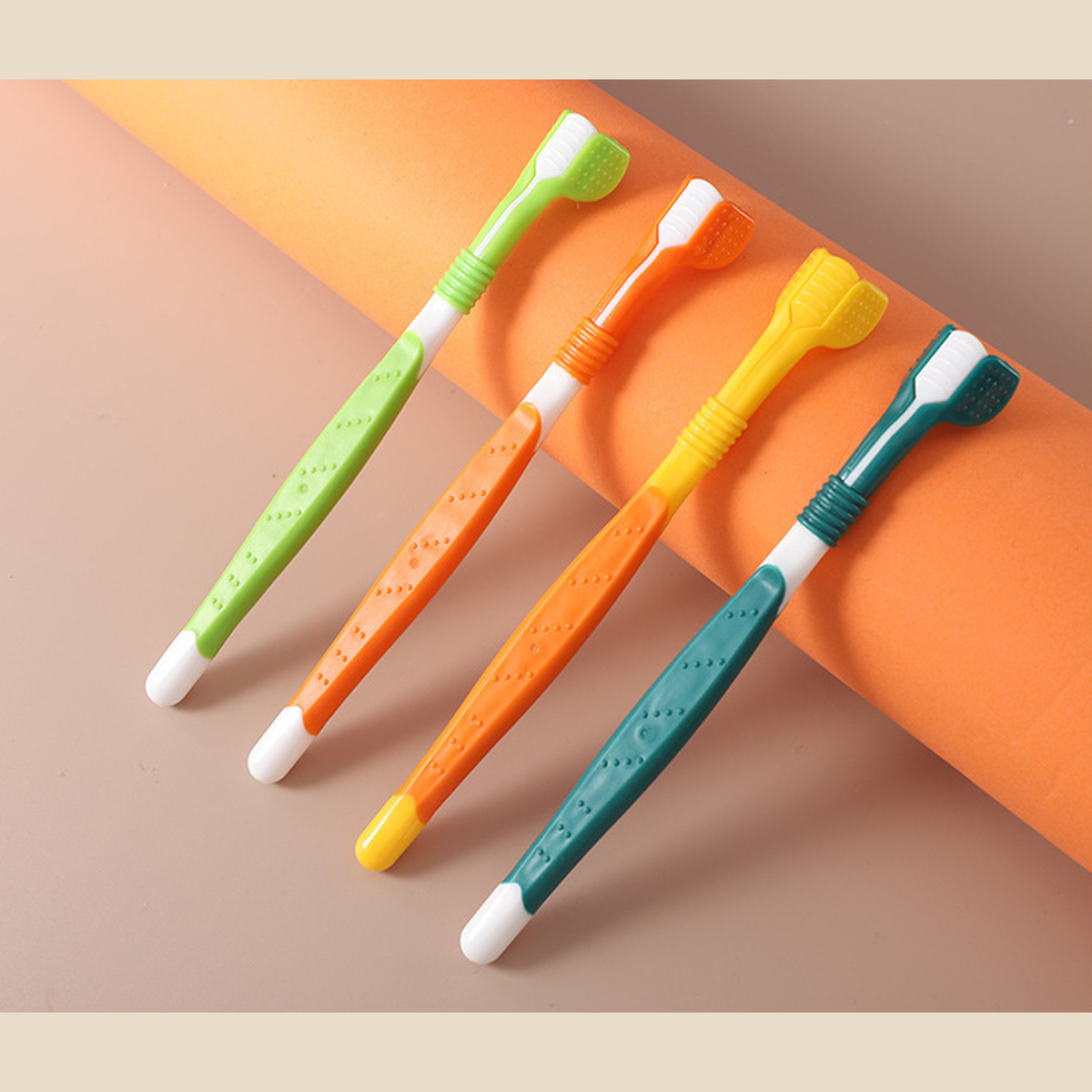 The four colours photographed together: light green, yellow, orange and teal. Colour examples, not a four-pack