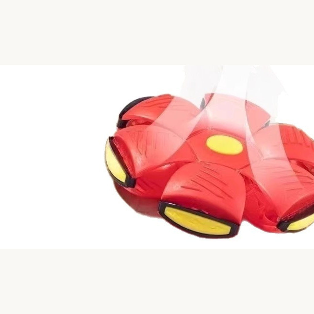 Red flying-saucer dog toy part-way between the ball shape and the disc shape