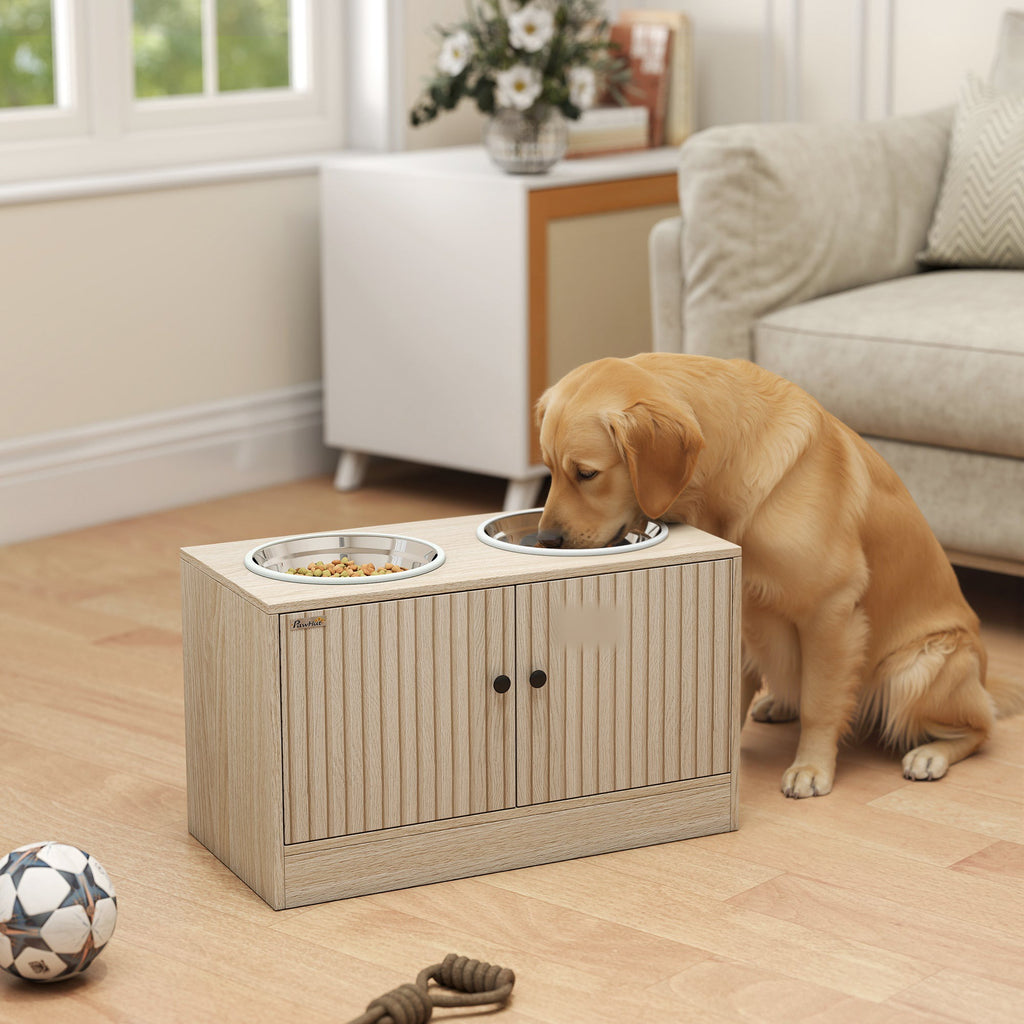 Elevated feeding station in a living room with a dog eating
