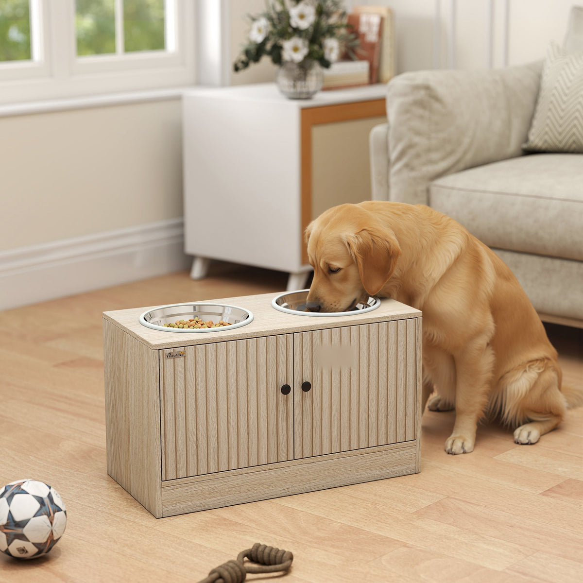 Elevated feeding station in a living room with a dog eating
